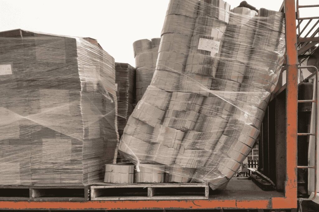 Shifted and unstable freight inside a trailer awaiting pallet restacking and repair in Tampa.