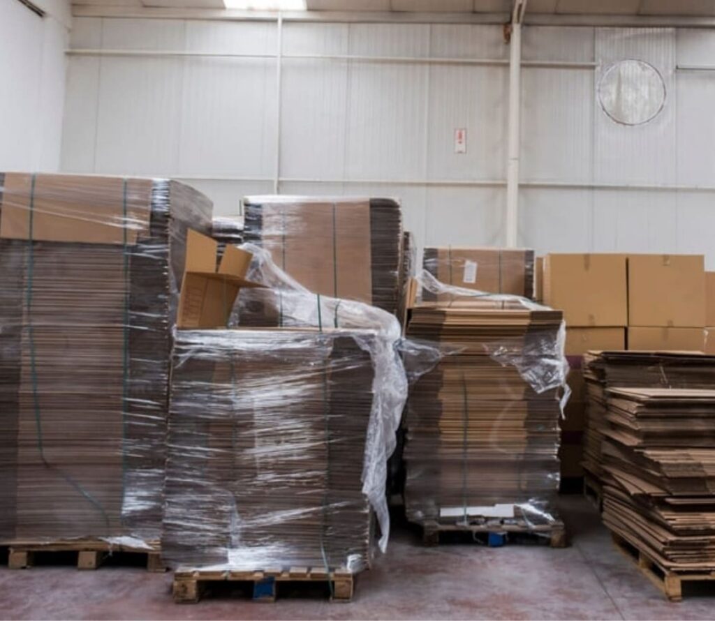 A detailed look at OLIMP Warehousing's efficient pallet rework process in Kansas City.