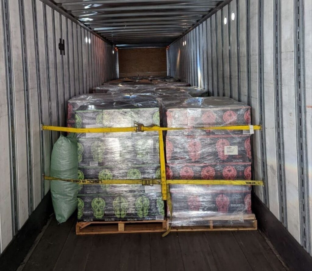 Pallet rework and load restacking services in Van Buren Charter Township Michigan warehouse.