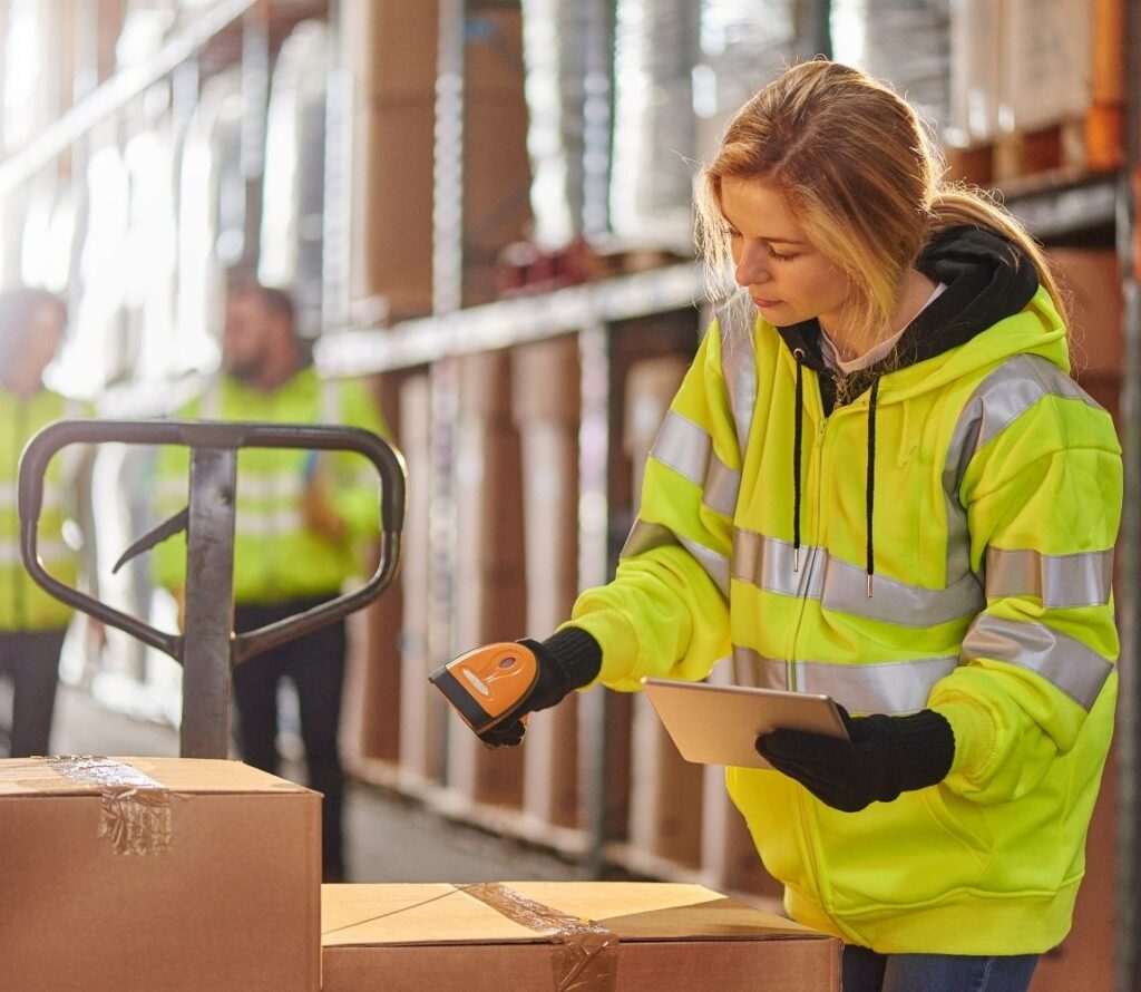 Streamlined inventory operations taking place in a well-organized logistics warehouse.