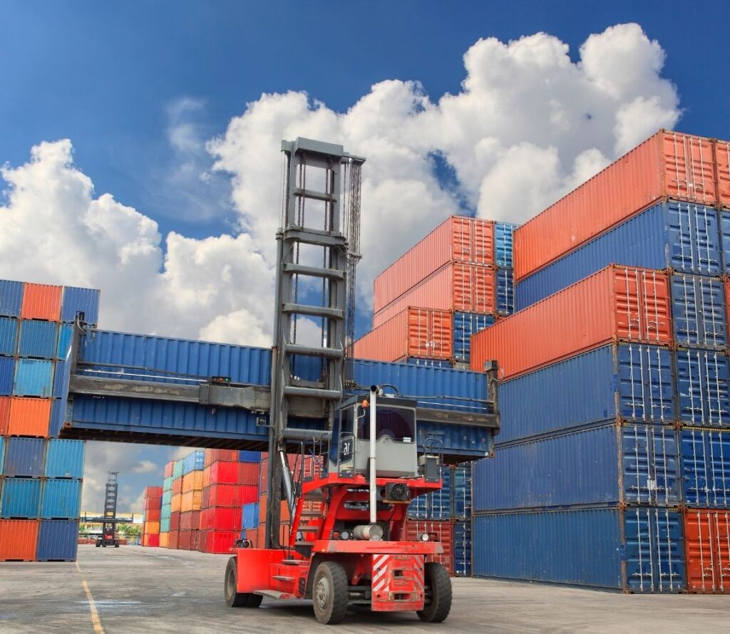 Container being transferred during the transloading process, supported by expert drayage solutions for smooth port-to-warehouse delivery
